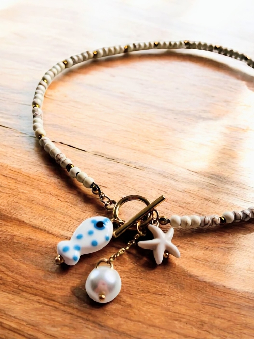 Ceramic starfish, fish and pearl charm necklace; 18.19" around neck; nwot - Picture 2 of 9